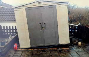 Shed lifted by wind